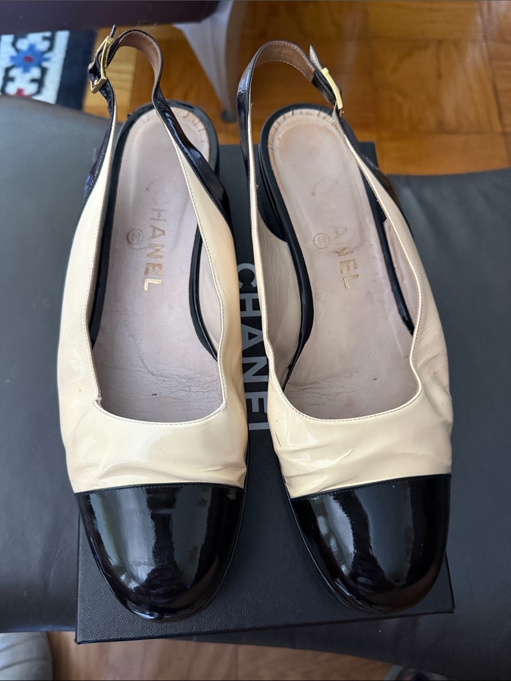 CHANEL Beige and Black Patent Cap-Toe Slingback Flats
Size 41